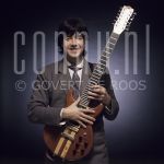 Duncan Brown at studio in Amsterdam.

[keywords]Posed, Half Length, Guitar, Smiling, Singer[/keywords]